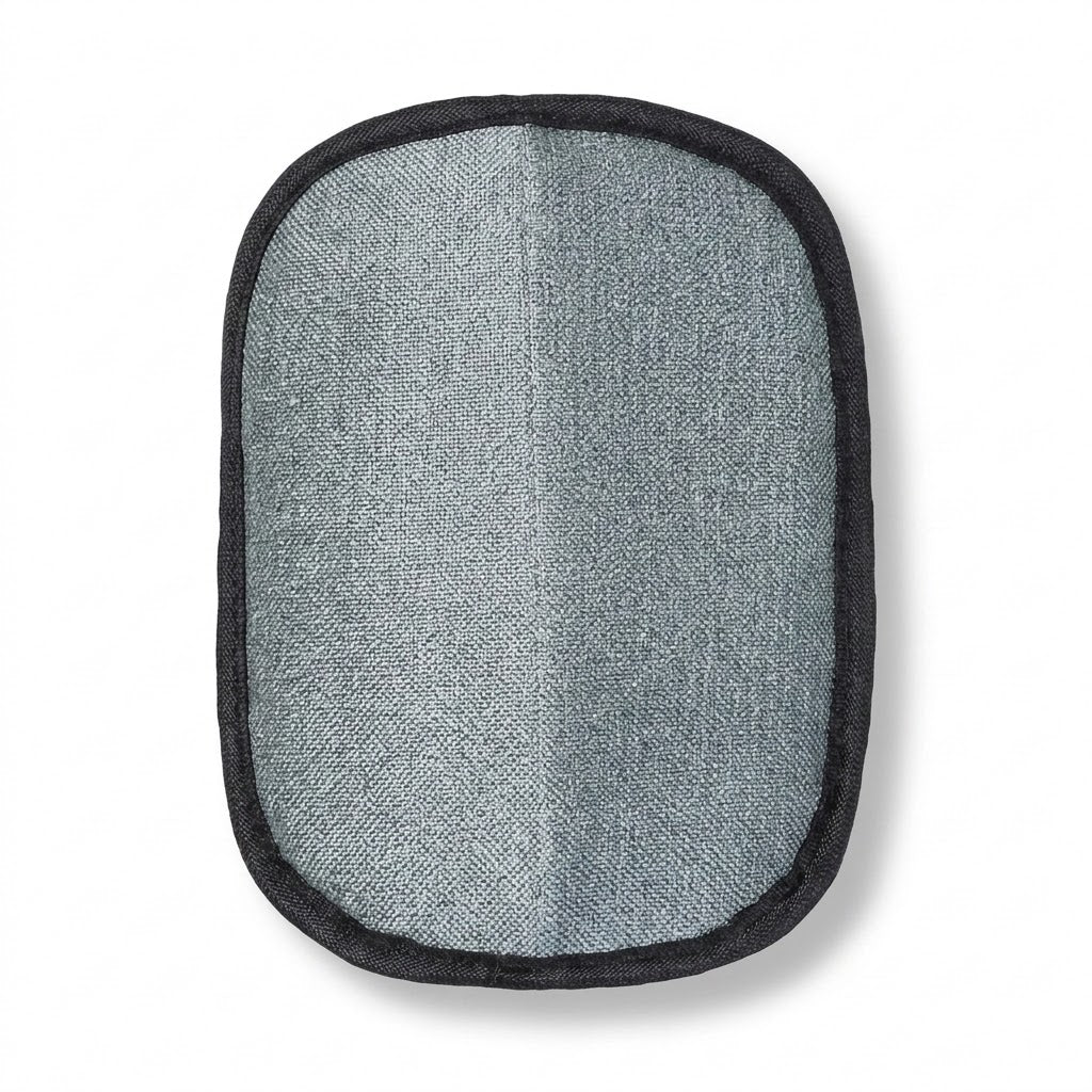Grey cleaning face of one reusable pet hair cleanup mitt with black fabric edging on a white background